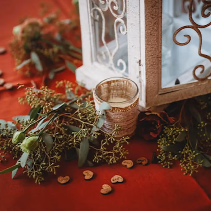 Create a warm and inviting ambiance with textural eucalyptus & candles.