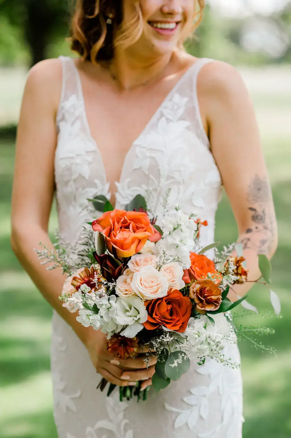 Real Poppy wedding — Orange Popsicle at The Vineyards at Chappel Lodge