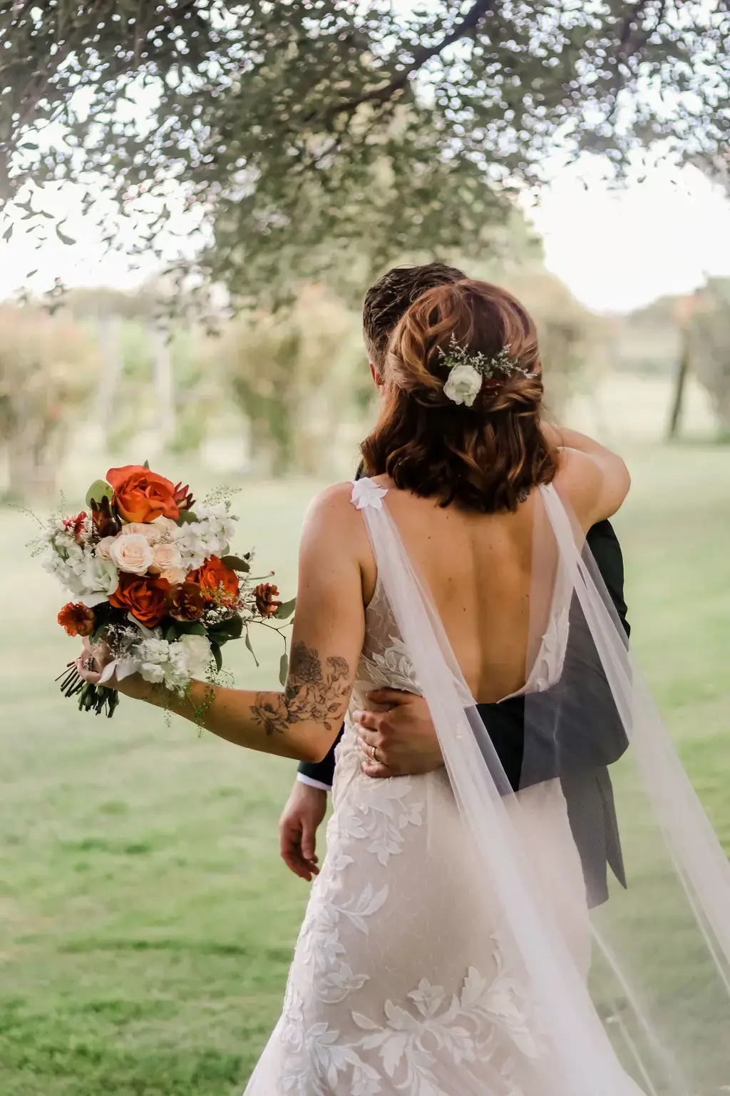 Real Poppy wedding — Orange Popsicle at The Vineyards at Chappel Lodge