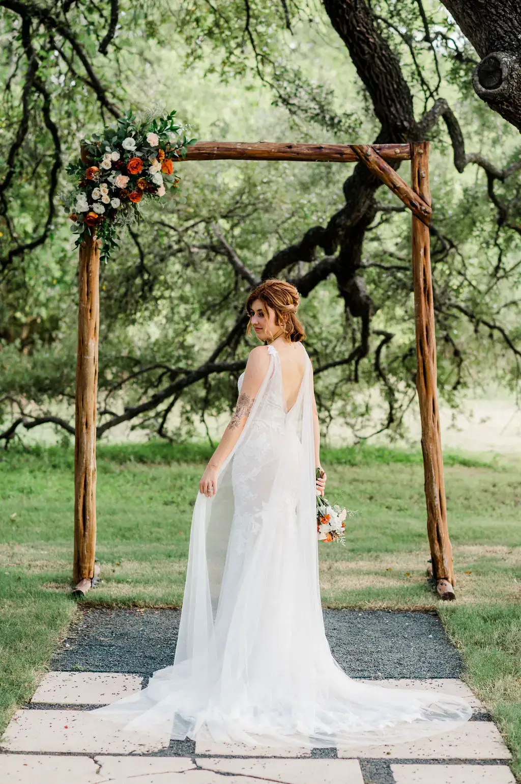 Real Poppy wedding — Orange Popsicle at The Vineyards at Chappel Lodge
