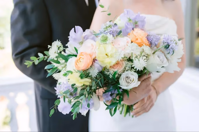 Spring flowers wedding bouquet with pastel colors and textures