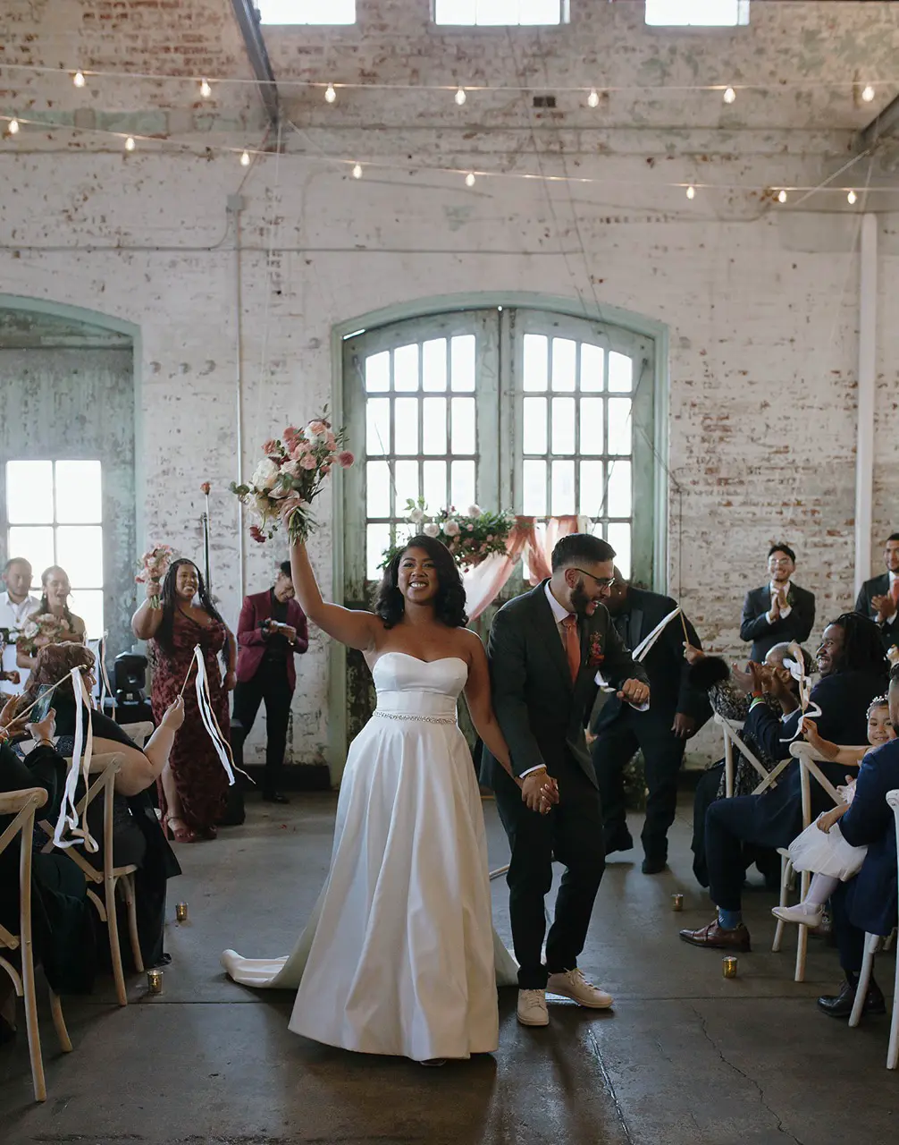 Real Poppy wedding — Kayla + Giovanni at The Arsenal