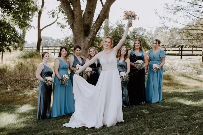 Bride holding her vibrant, freshly arranged bridal bouquet