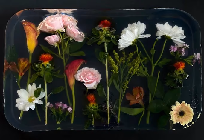 Creating a resin keepsake out of wedding flowers and foliage