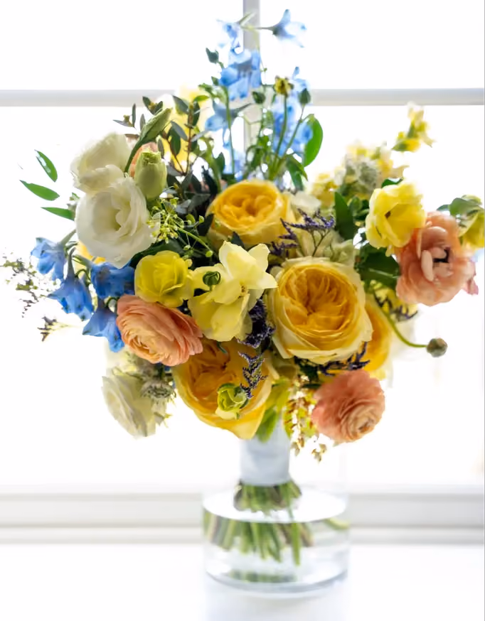 A vase featuring the fall flower color palette
