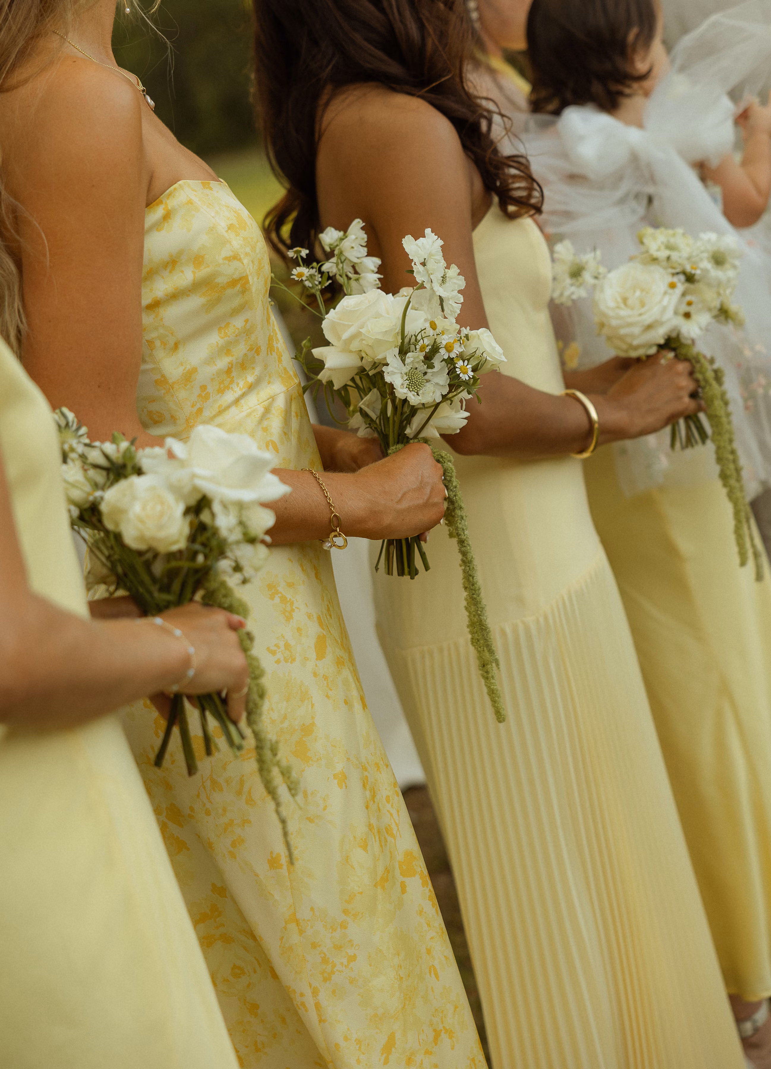 Asymmetrical modern bridesmaid bouquet with sculptural stems