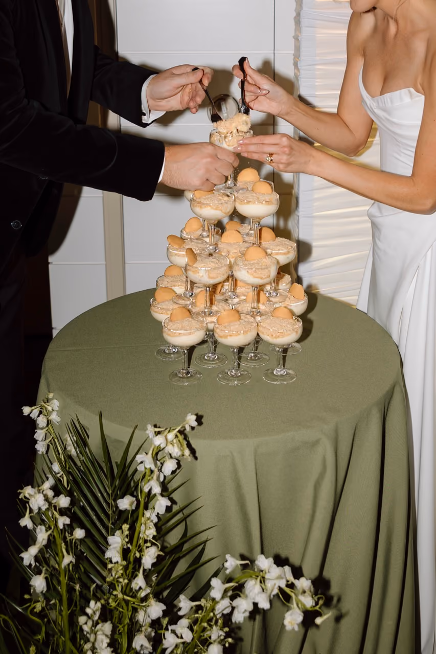 White oriental lily and palm frond wedding arrangements for Oceanside California wedding