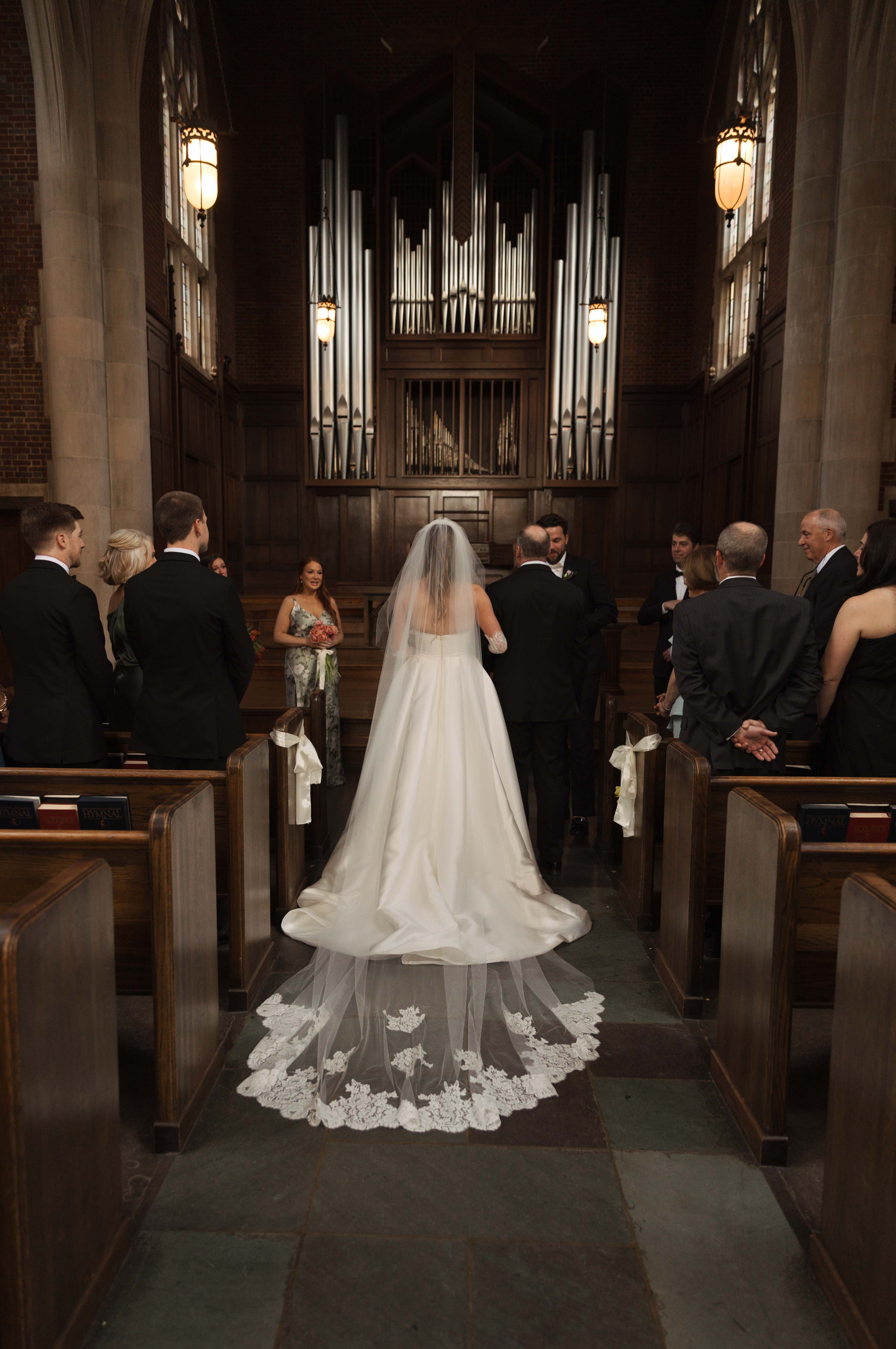 Wedding ceremony florals at intimate Nashville chapel by Poppy Flowers