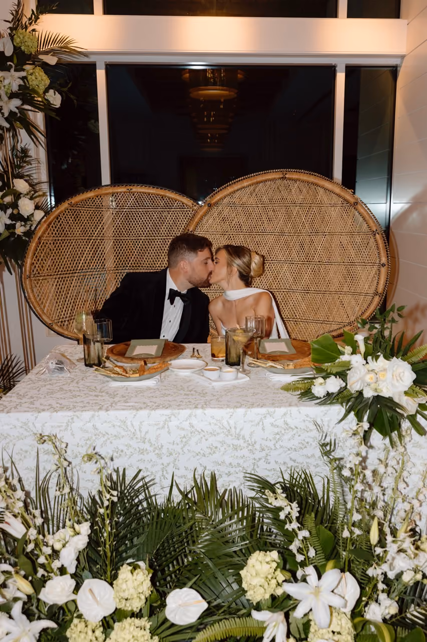 Tropical wedding florals in white and green palette by San Diego wedding florist