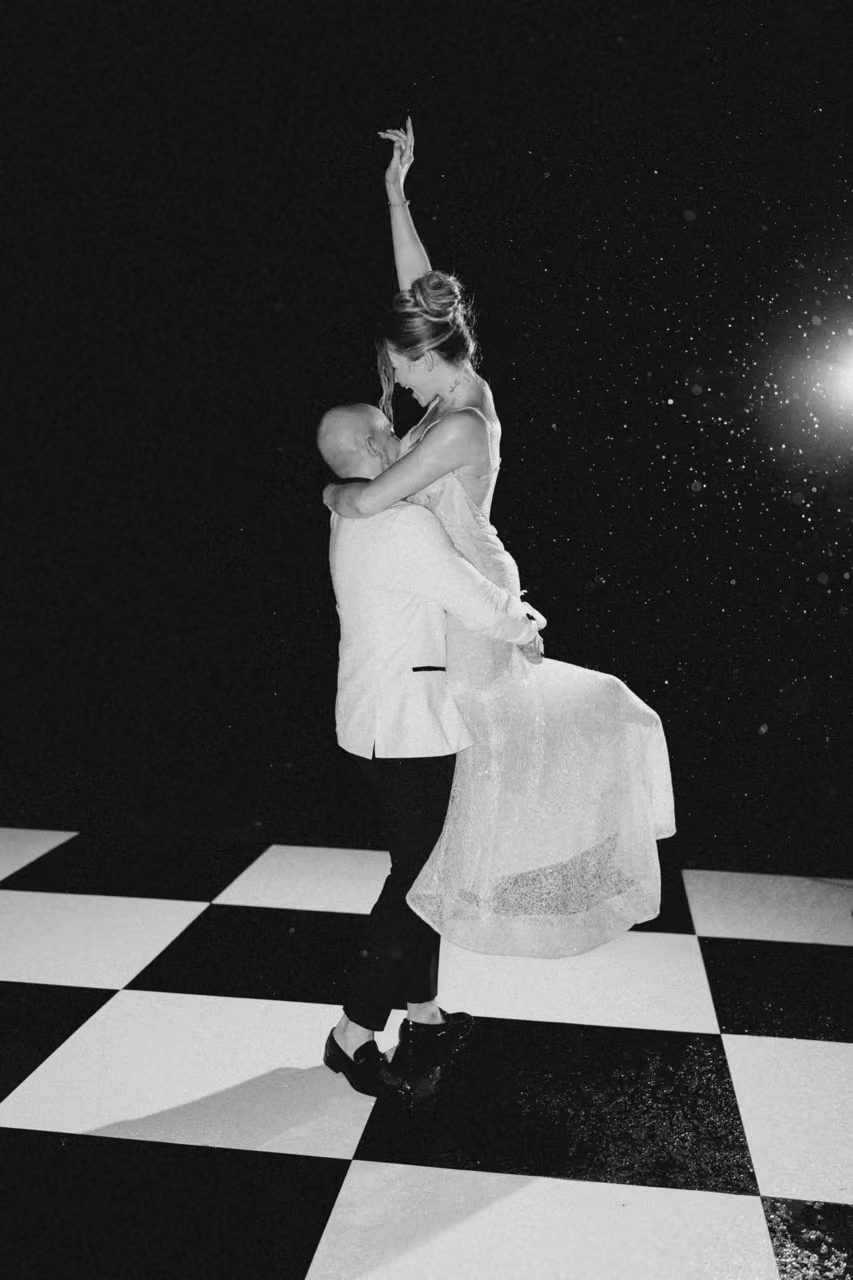 Black and white checkered dance floor at Connecticut wedding reception