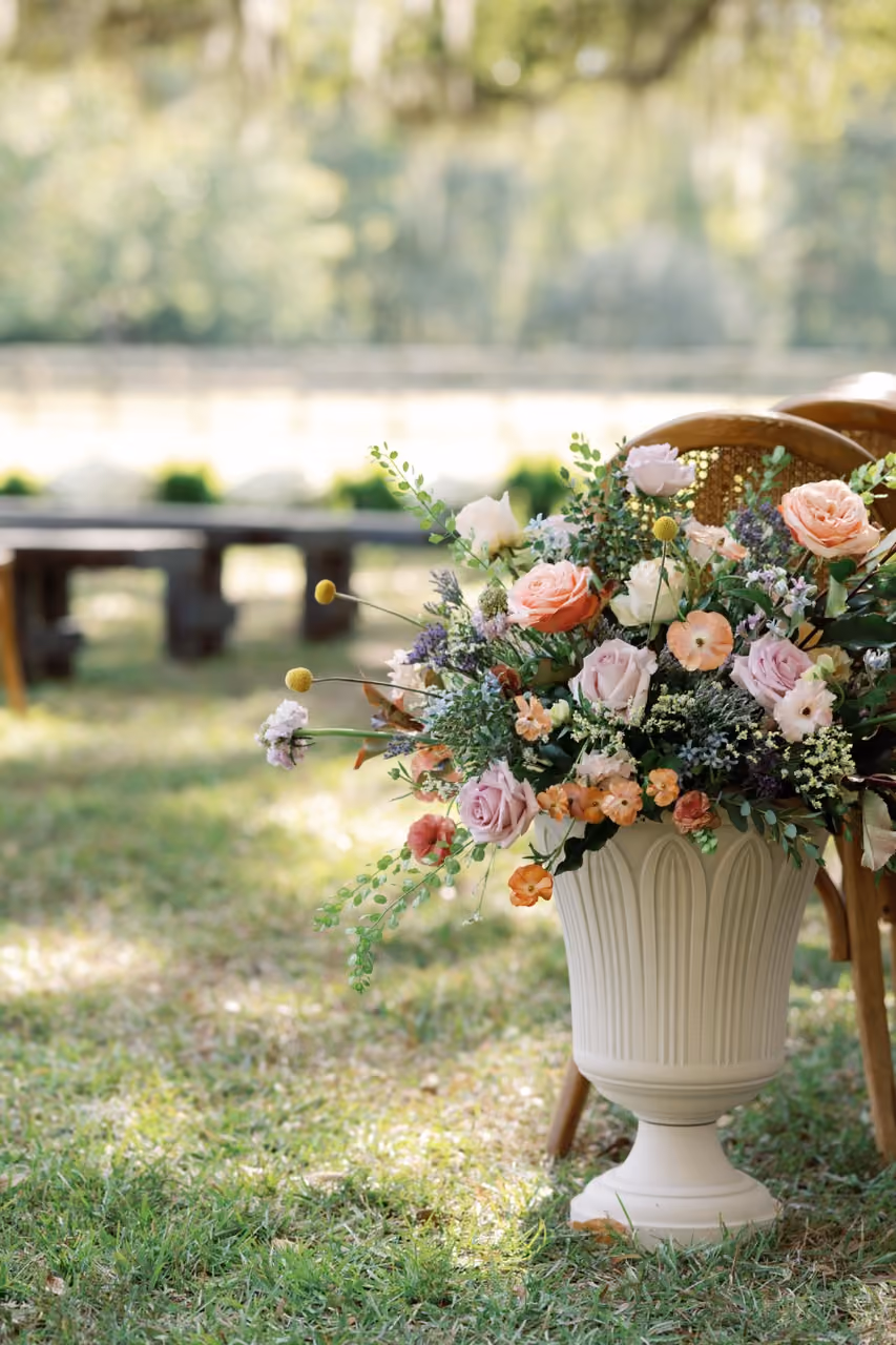 Wedding ceremony with floral arrangements designed within a mid-range budget