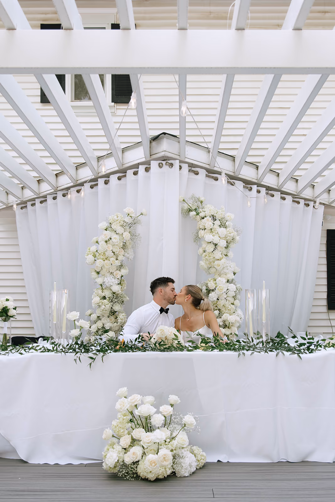 reception sweetheart table flowers