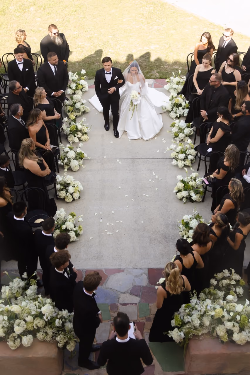 Real Poppy wedding — Isabella + Carter at The Howey Mansion