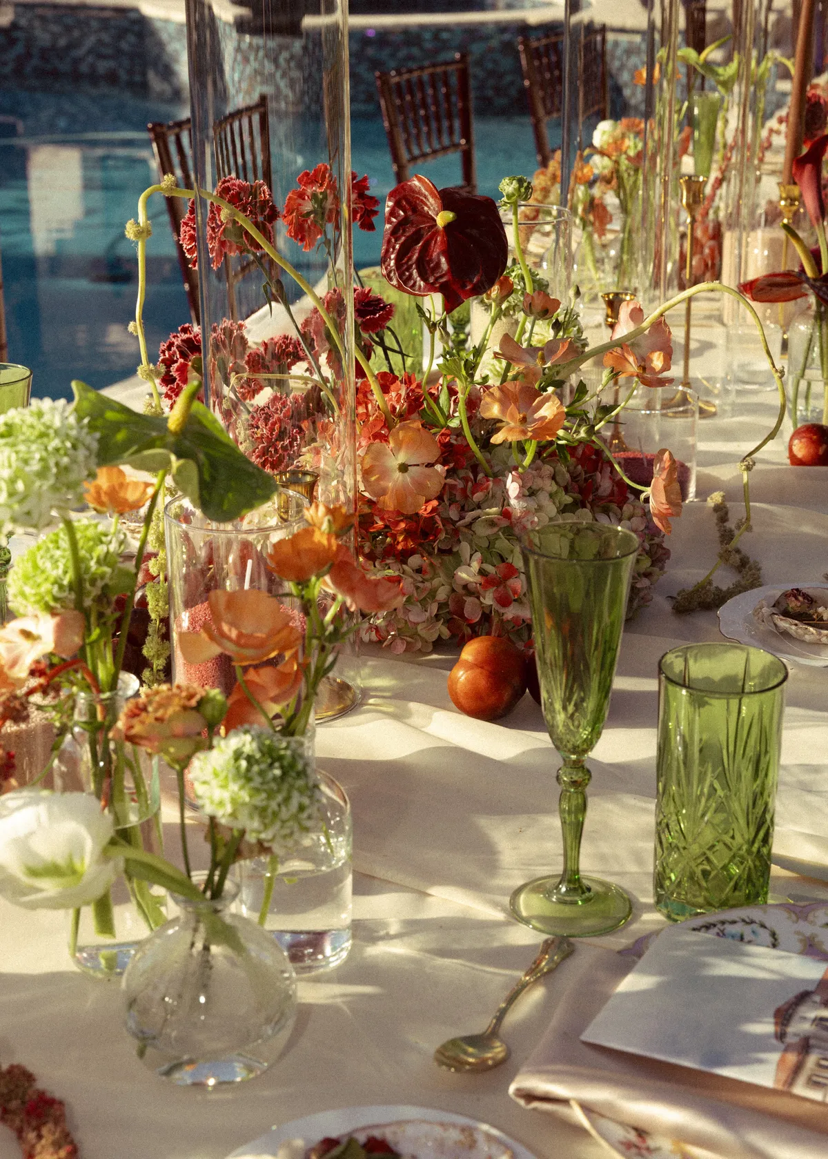 Layered florals with extra depth, texture, and scale from a $5,000+ Poppy wedding
