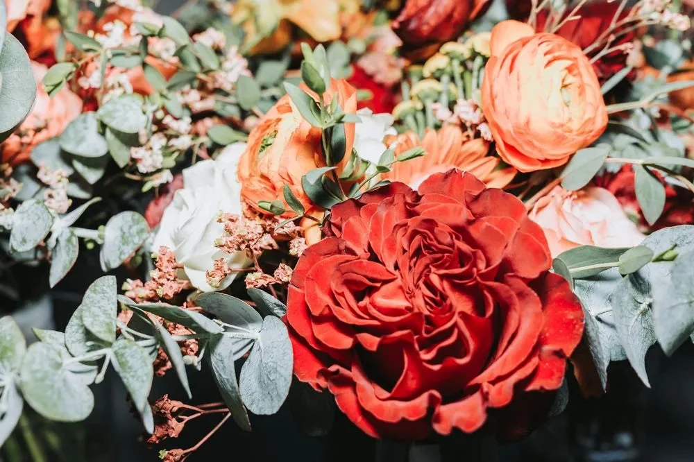 Customer-submitted wedding flower photo from WeddingWire review by Sydney.