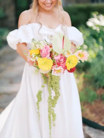 Customer-submitted wedding flower photo from The Knot review by Megan Hunstad.