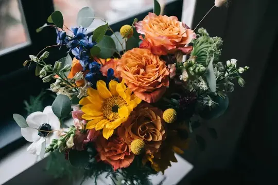 Customer-submitted wedding flower photo from WeddingWire review by Hannah.