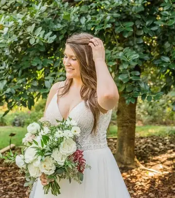 Customer-submitted wedding flower photo from WeddingWire review by Erin.